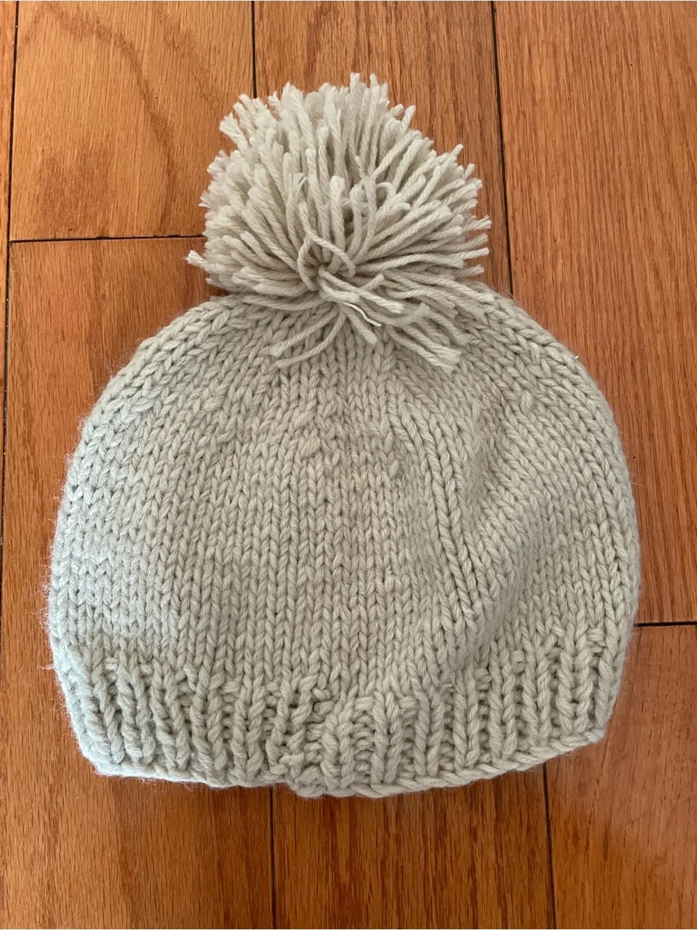 Pom Beanie with Bird Accent